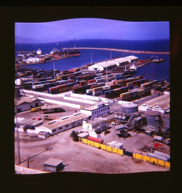 A collage showing a cargo ship, a freight train, and a semi-truck on top, and a factory assembly line on the bottom, representing the transportation and manufacturing sectors' reliance on oil.