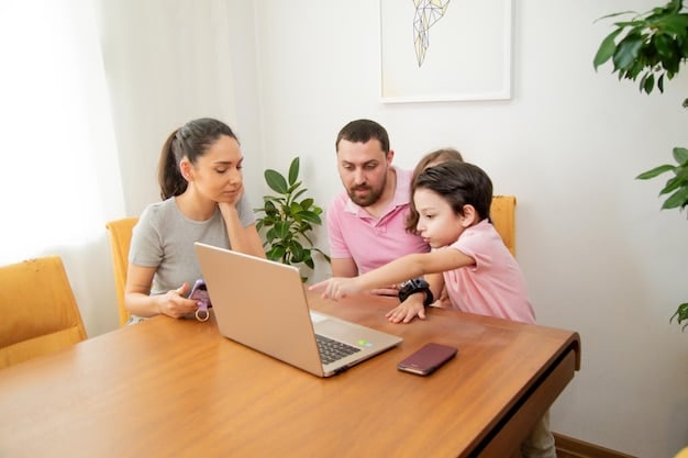 A family sitting at a table, reviewing health insurance options on a laptop with a visible display of ACA subsidy information.