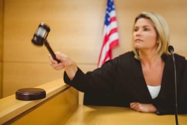 A gavel resting on a stack of legal documents and a blurred background with people at a hearing, representing the right to a fair and impartial hearing.