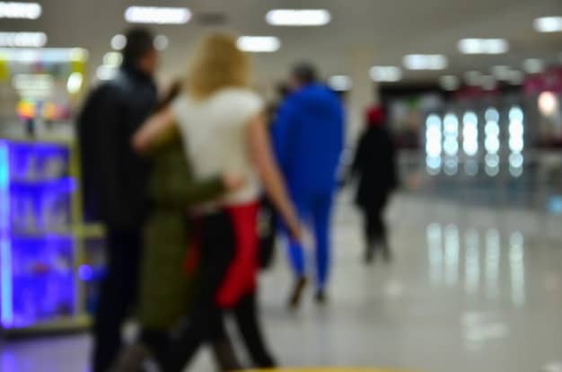 A diverse group of people are shown in a blurred background, waiting in line at a government office. In the foreground, a hand holds a printed criminal record certificate, highlighting the document's importance for various bureaucratic processes.