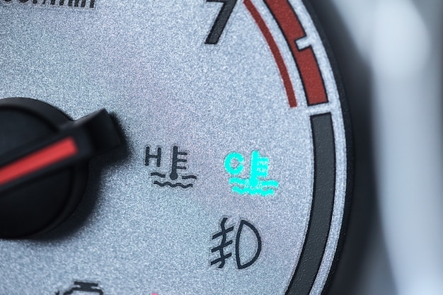 A close-up of a fuel pump showing a rising price, symbolizing the impact of inflation on everyday expenses.
