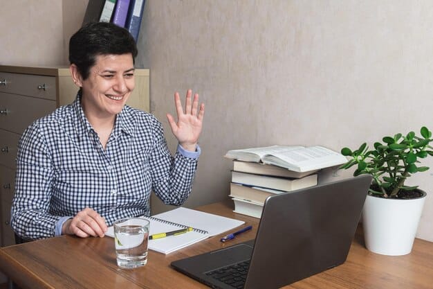 A person on a video call with a financial advisor, discussing debt negotiation strategies. The advisor looks friendly and helpful, and the person is taking notes.