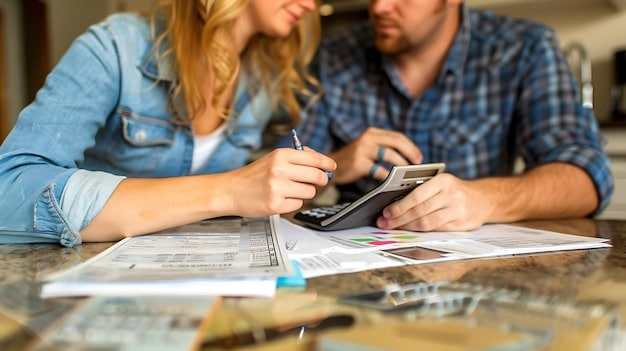 A person using a financial calculator to compare loan options with different interest rates and terms, while reviewing various documents related to real estate financing.